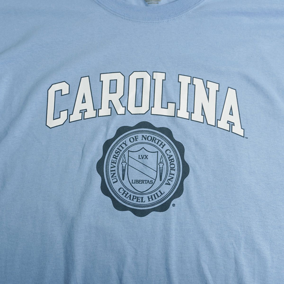 UNIVERSITYOFNORTHCAROLINAターヒールズオフィシャルロゴTシャツチャンピオンボディ
